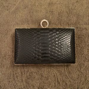 Black leather clutch